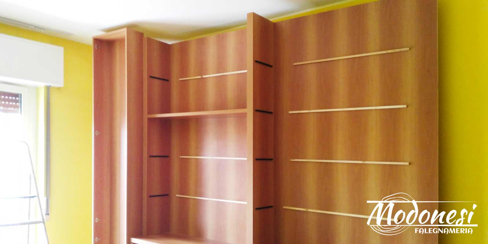 Libreria boiserie su misura in legno per avvocato di milano Falegnameria a milano